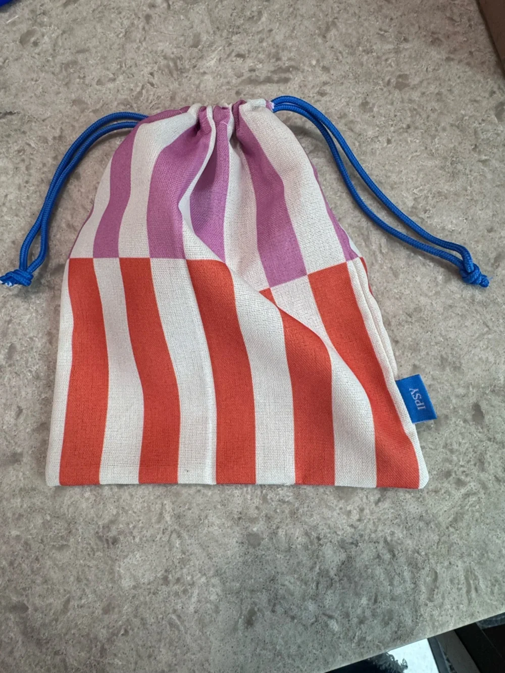 ipsy Striped Drawstring Cosmetic Bag in Pink, Orange, White with Blue Cord
